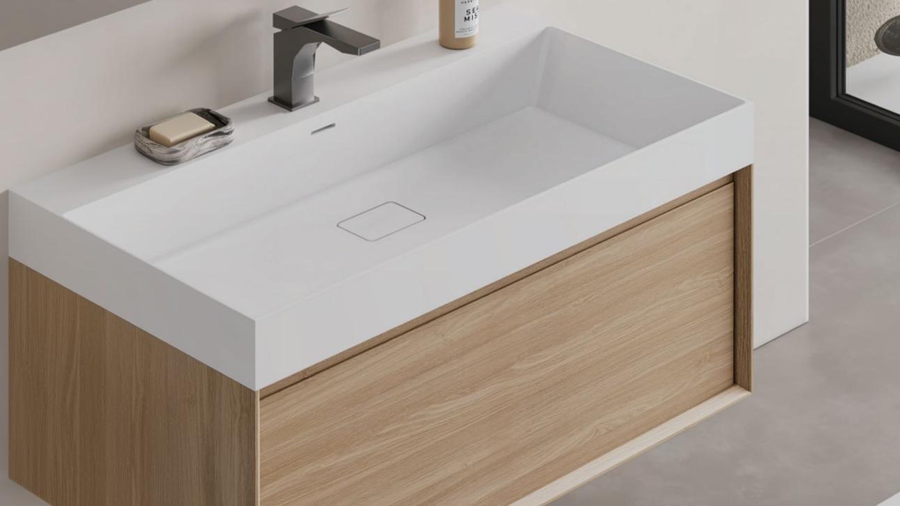 Cpingao's Plywood bathroom cabinets are paired with a solid surface integrated wash basin.